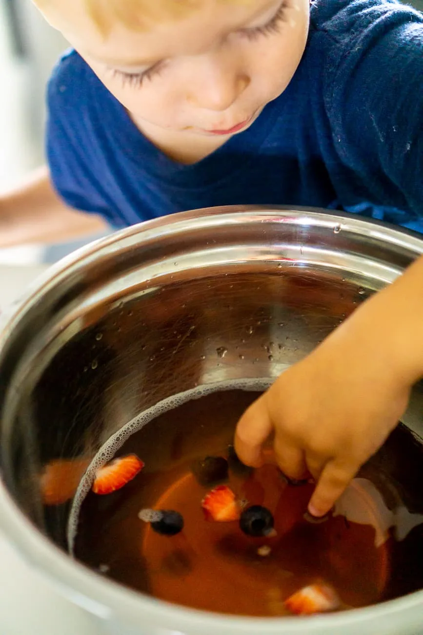 jello sensory activity - toddler making jello