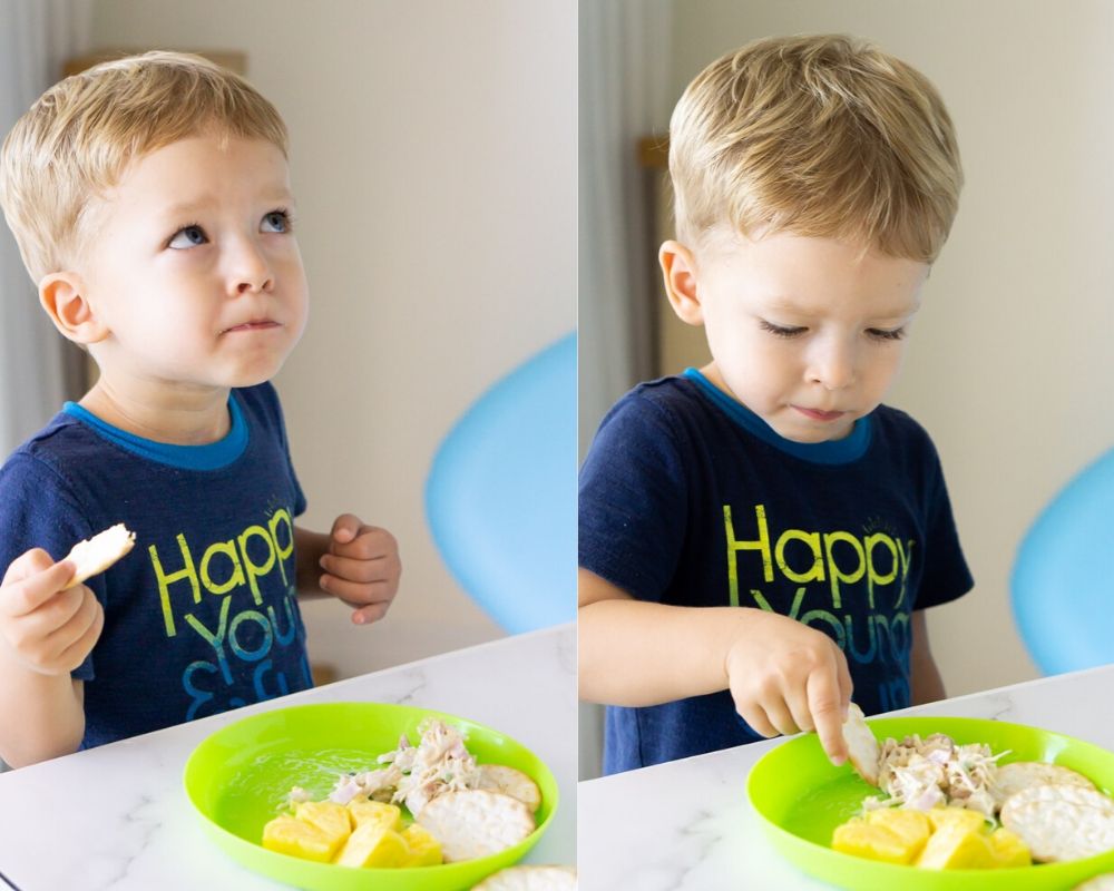 toddler eating chickens salad