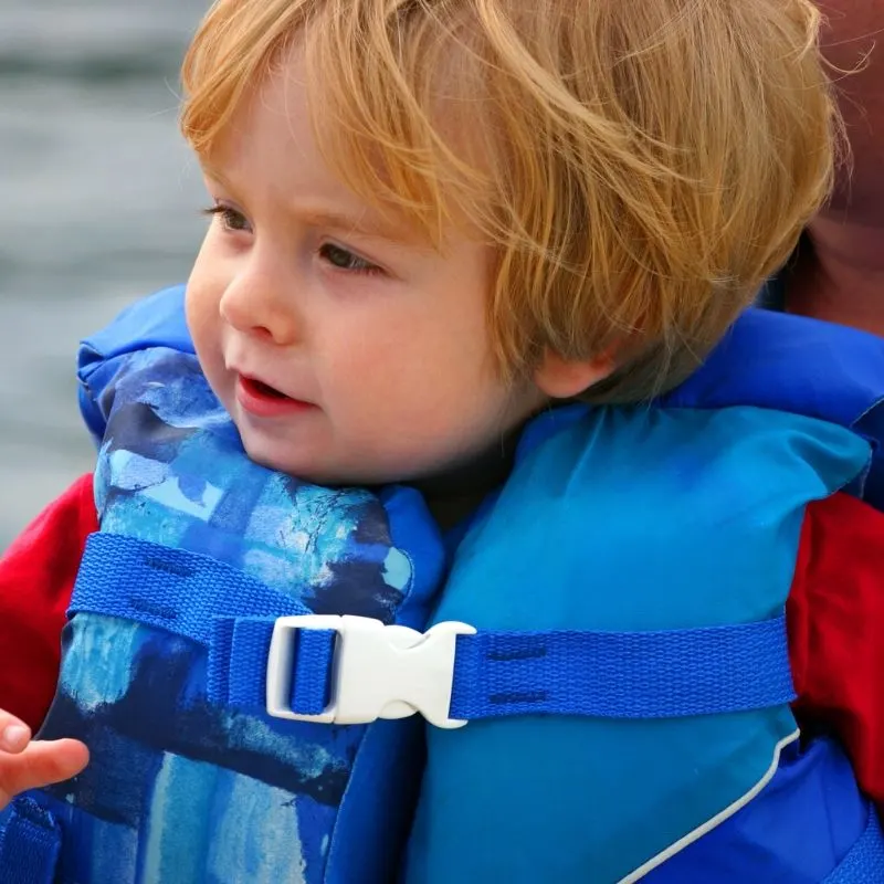 toddler in a life vest