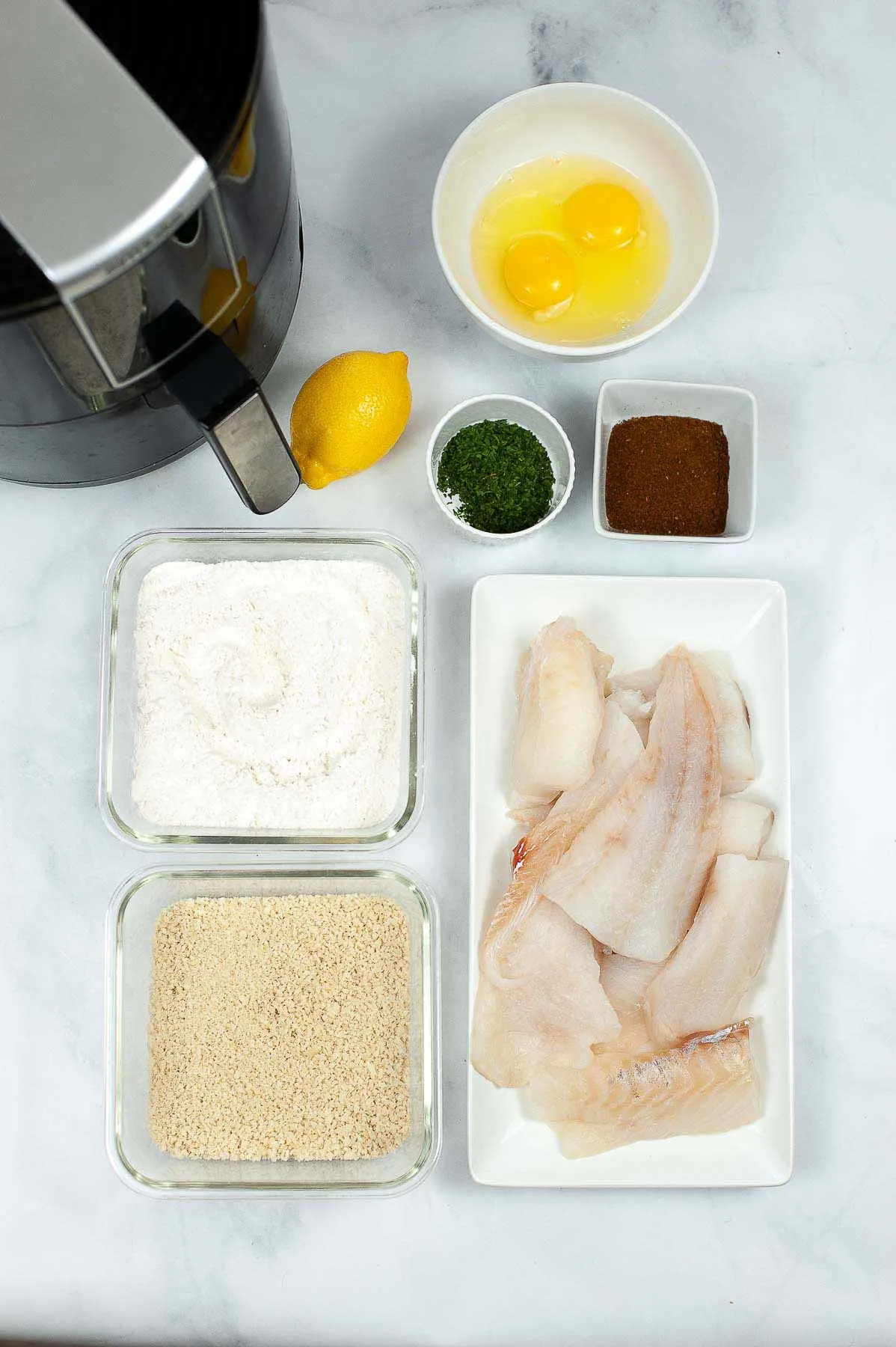 Ingredients to make air fryer fish sticks.