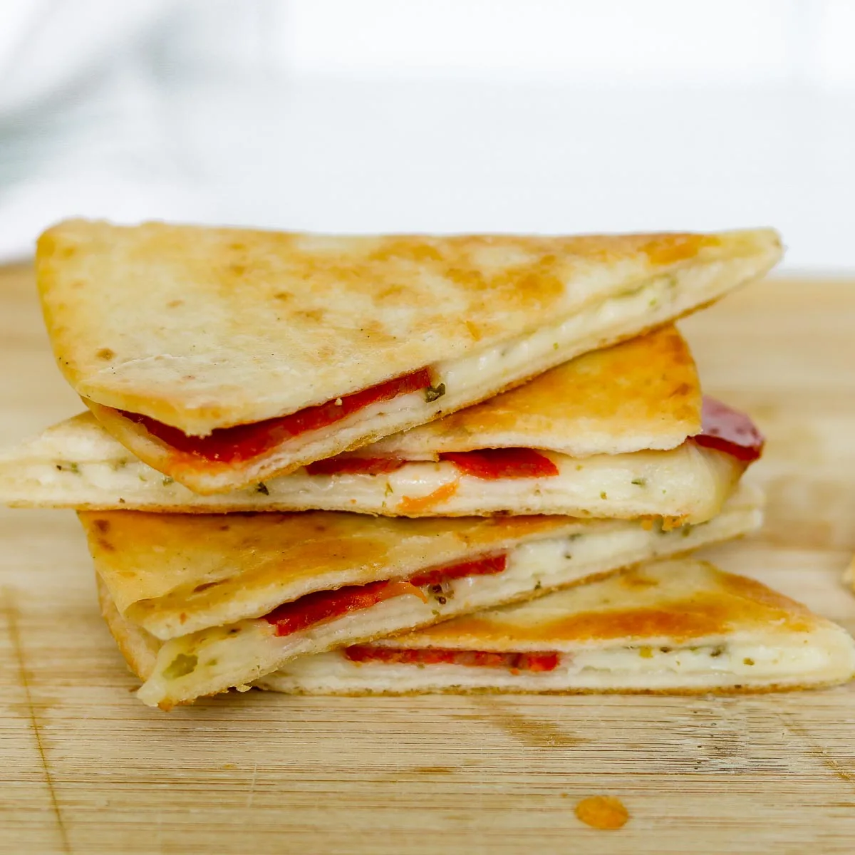 Stack of pepperoni pizza quesadillas.