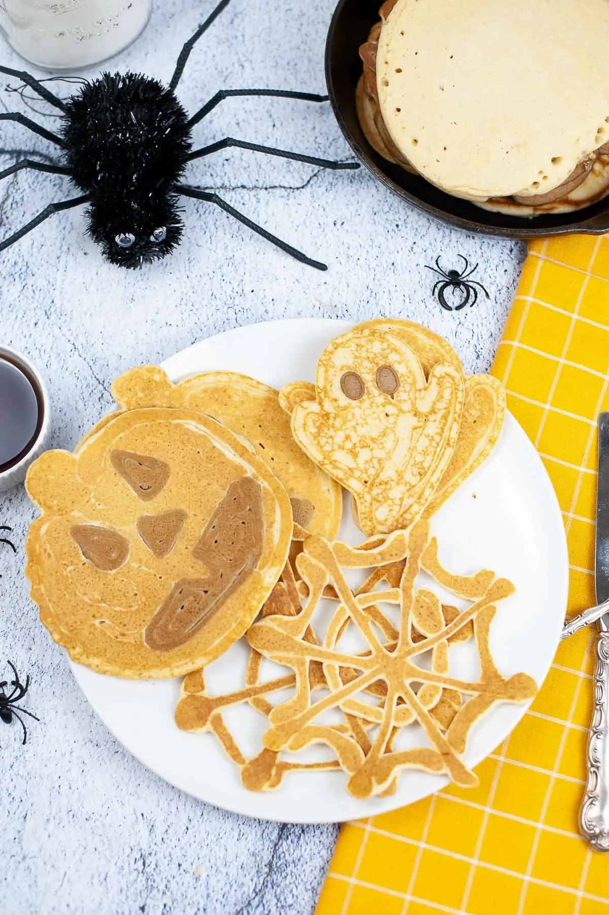 Halloween breakfast plate with Halloween shaped pancakes.